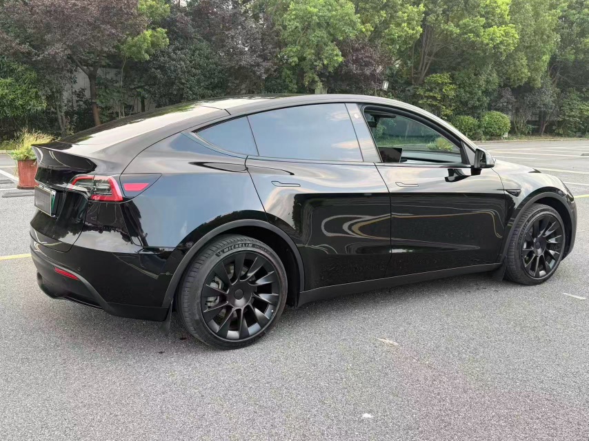 Tesla Model Y 2024 #9 Tesla Model Y 2024 car image #9