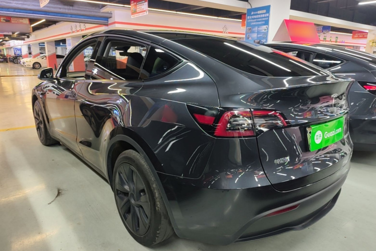 Tesla Model Y 2024 #5 Tesla Model Y 2024 car image #5