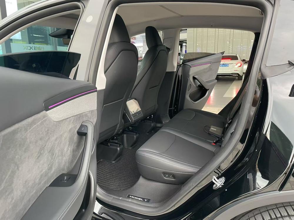 Tesla Model Y 2025 #15 Tesla Model Y 2025 car image #15