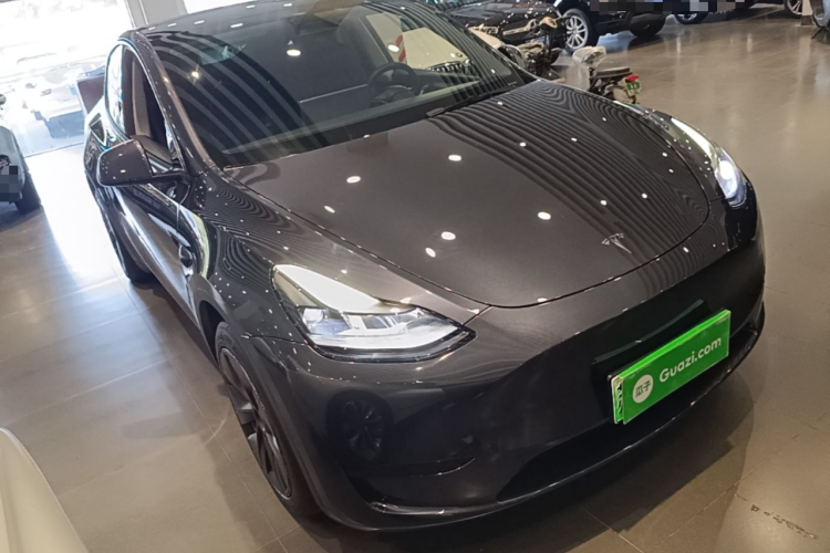 Tesla Model Y 2024 #6 Tesla Model Y 2024 car image #6