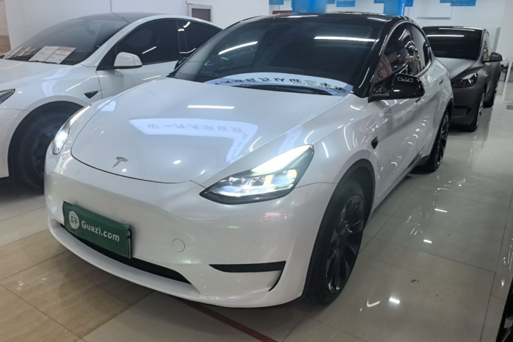 Tesla Model Y 2024 #2 Tesla Model Y 2024 car image #2