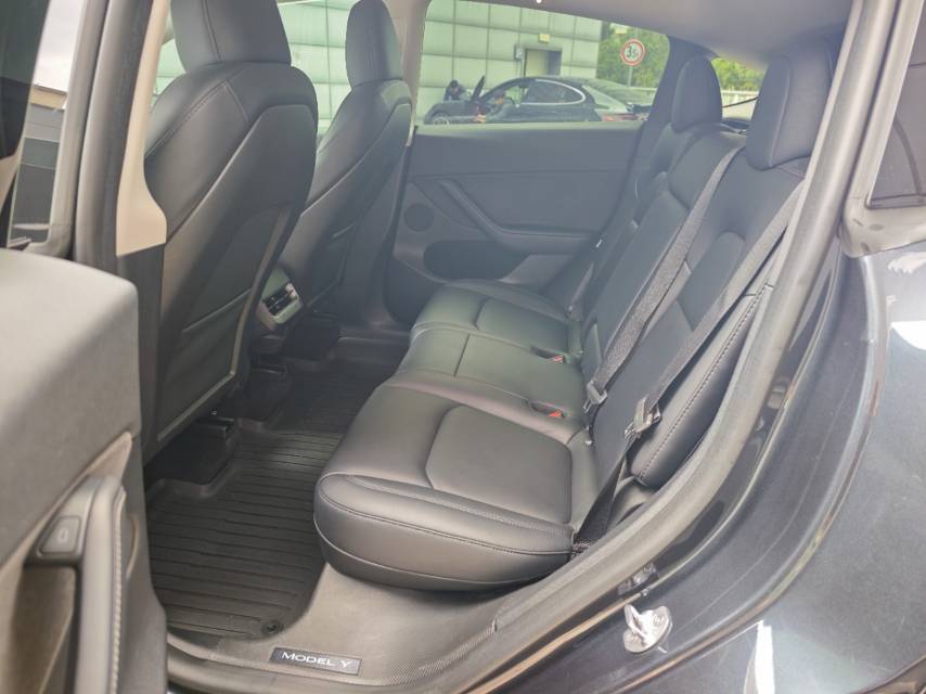 Tesla Model Y 2024 #6 Tesla Model Y 2024 car image #6