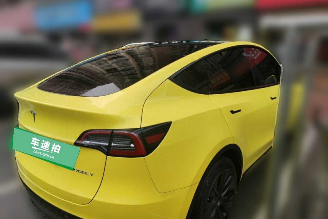 Tesla Model Y 2024 صورة سيارة #4
