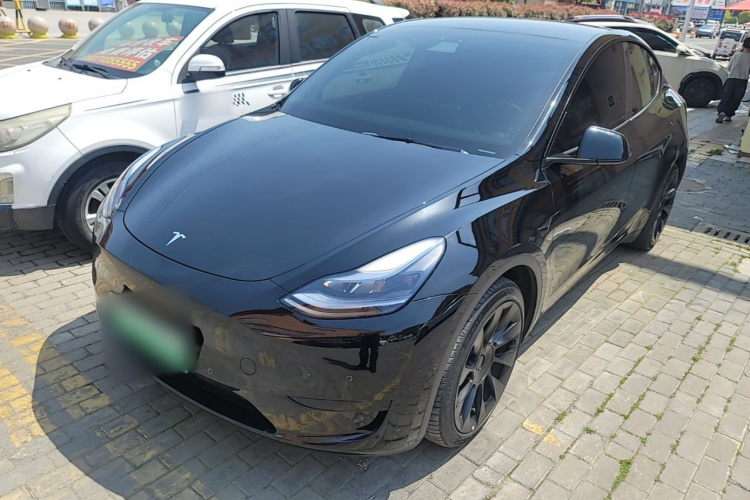Tesla Model Y 2023 #2 Tesla Model Y 2023 car image #2