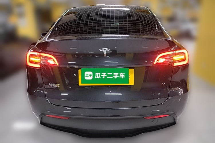 Tesla Model Y 2024 #6 Tesla Model Y 2024 car image #6