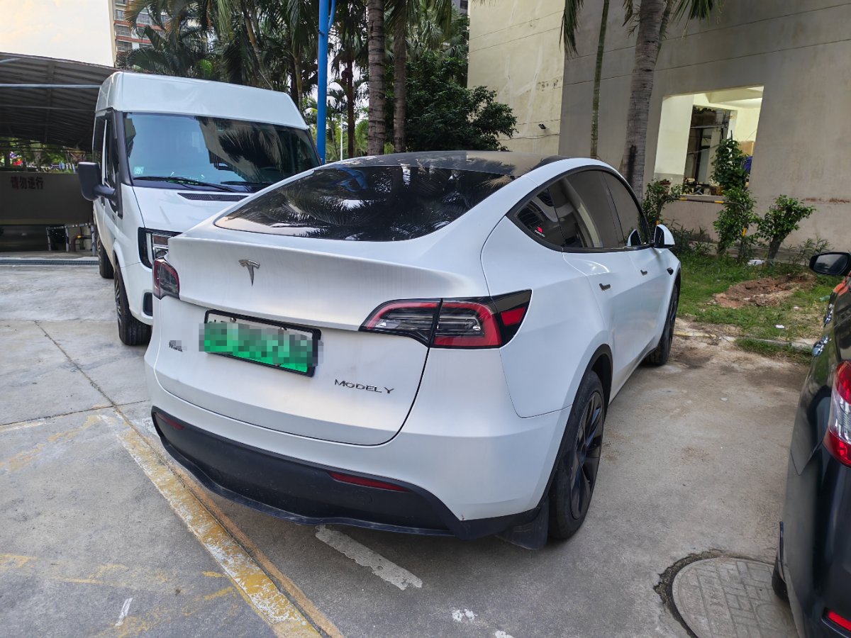 Tesla Model Y 2024 #3 Tesla Model Y 2024 car image #3