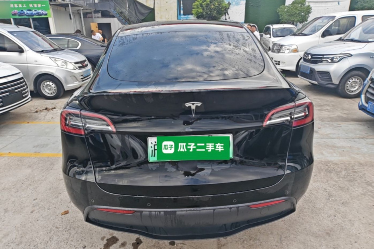 Tesla Model Y 2023 #6 Tesla Model Y 2023 car image #6