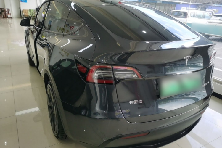 Tesla Model Y 2024 #5 Tesla Model Y 2024 car image #5
