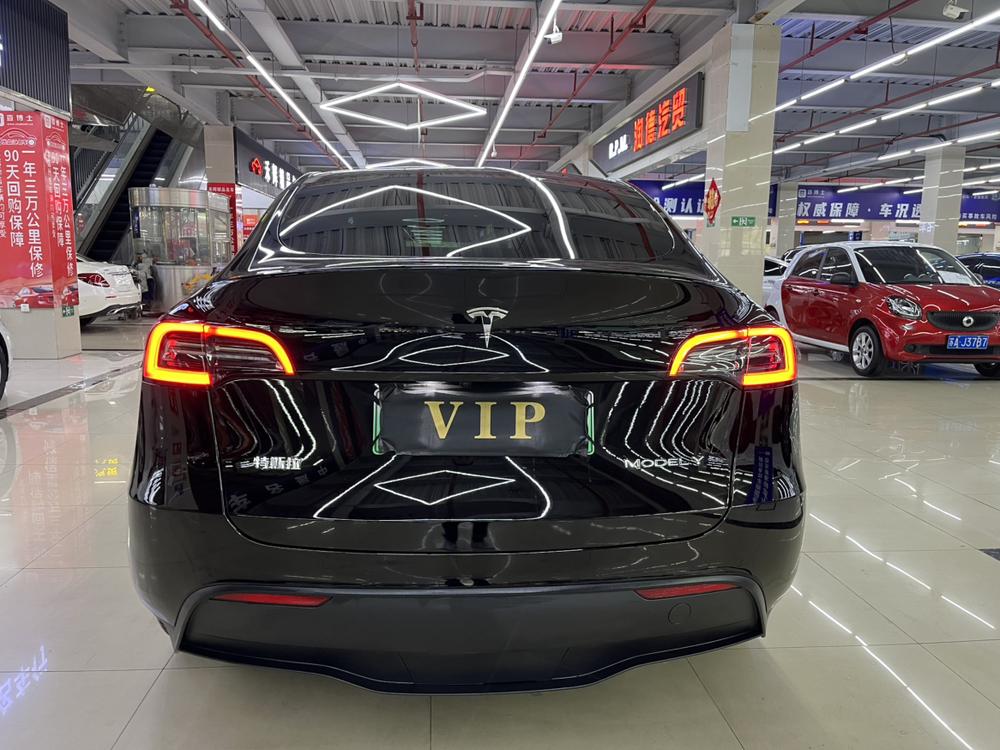 Tesla Model Y 2024 #5 Tesla Model Y 2024 car image #5