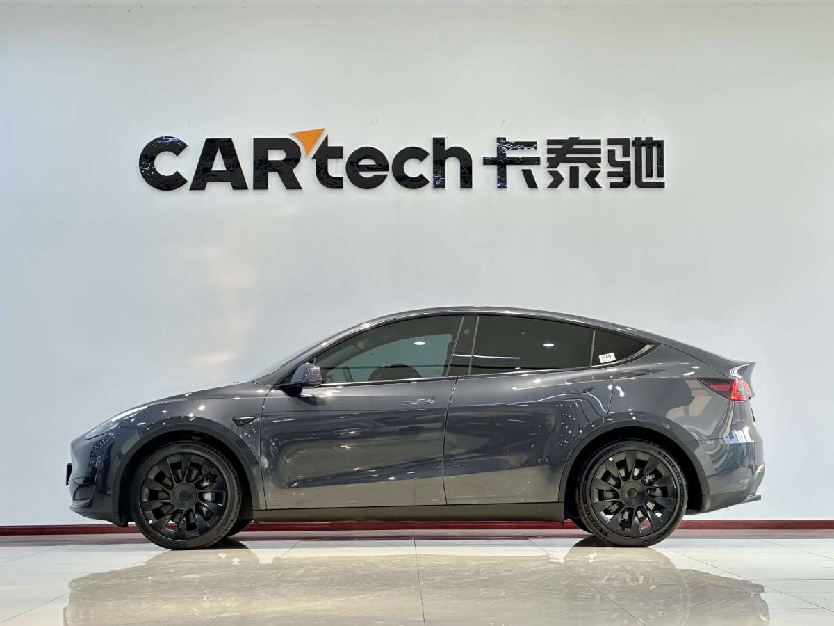 Tesla Model Y 2024 #7 Tesla Model Y 2024 car image #7