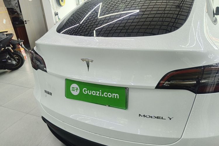 Tesla Model Y 2024 #6 Tesla Model Y 2024 car image #6