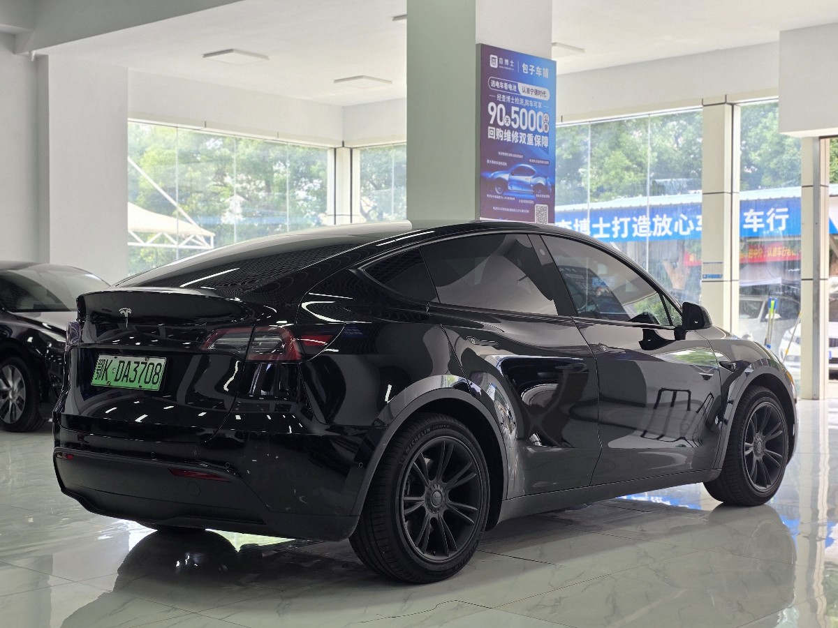 Tesla Model Y 2024 #5 Tesla Model Y 2024 car image #5