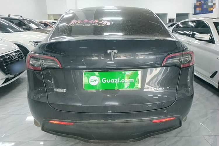 Tesla Model Y 2024 #4 Tesla Model Y 2024 car image #4
