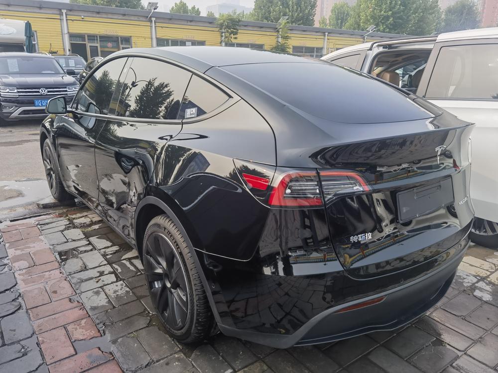 Tesla Model Y 2023 #4 Tesla Model Y 2023 car image #4