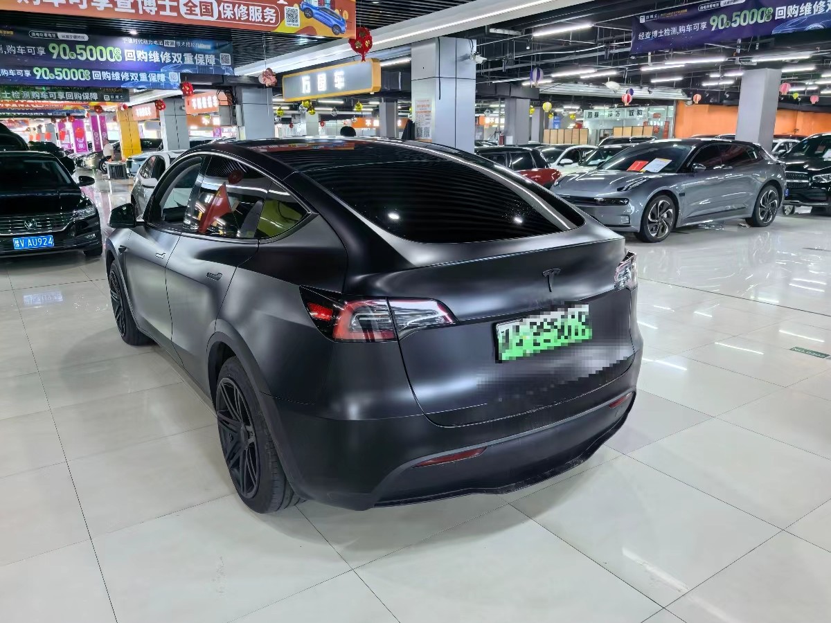 Tesla Model Y 2024 #9 Tesla Model Y 2024 car image #9
