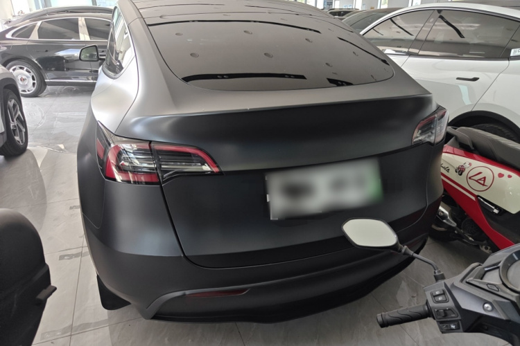 Tesla Model Y 2024 #6 Tesla Model Y 2024 car image #6