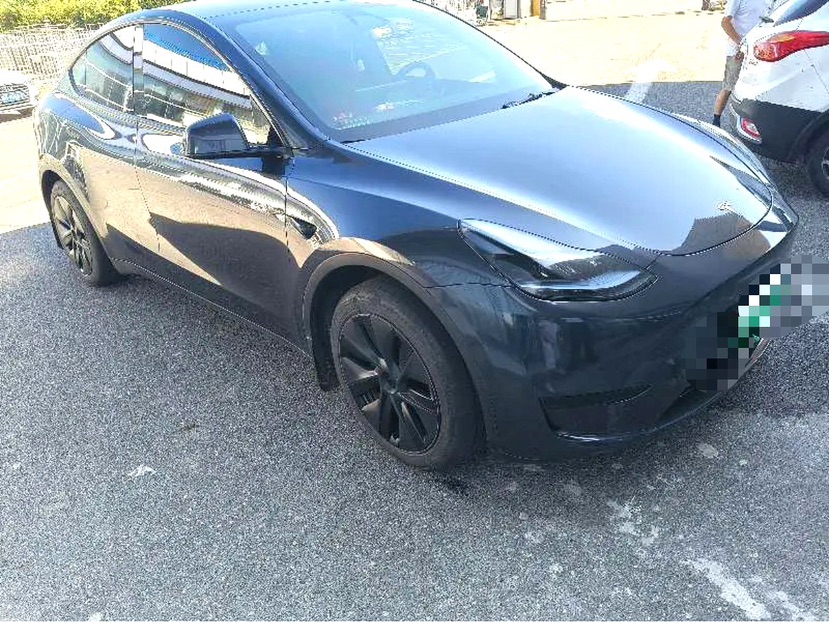 Tesla Model Y 2024 #3 Tesla Model Y 2024 car image #3