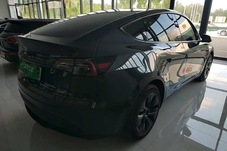 Tesla Model Y 2024 #7 Tesla Model Y 2024 car image #7
