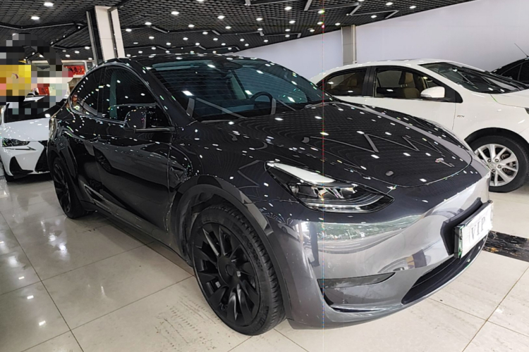 Tesla Model Y 2024 #4 Tesla Model Y 2024 car image #4