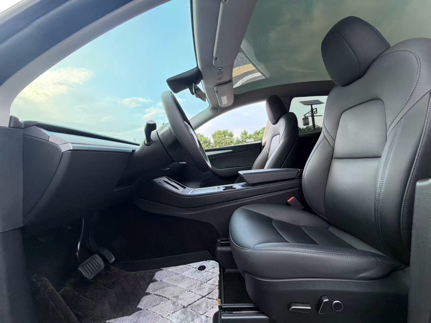 Tesla Model Y 2024 #4 Tesla Model Y 2024 car image #4