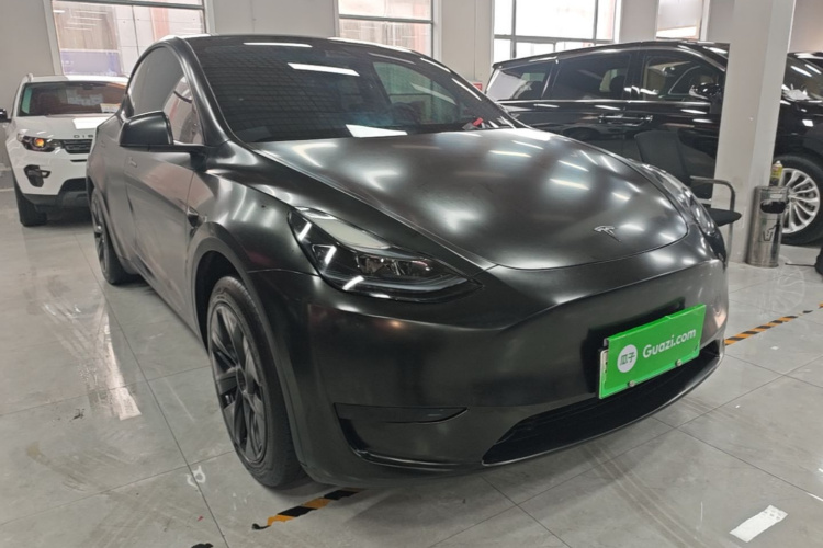 Tesla Model Y 2024 #4 Tesla Model Y 2024 car image #4