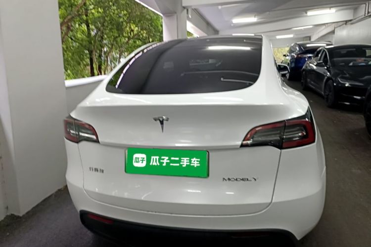 Tesla Model Y 2024 #6 Tesla Model Y 2024 car image #6