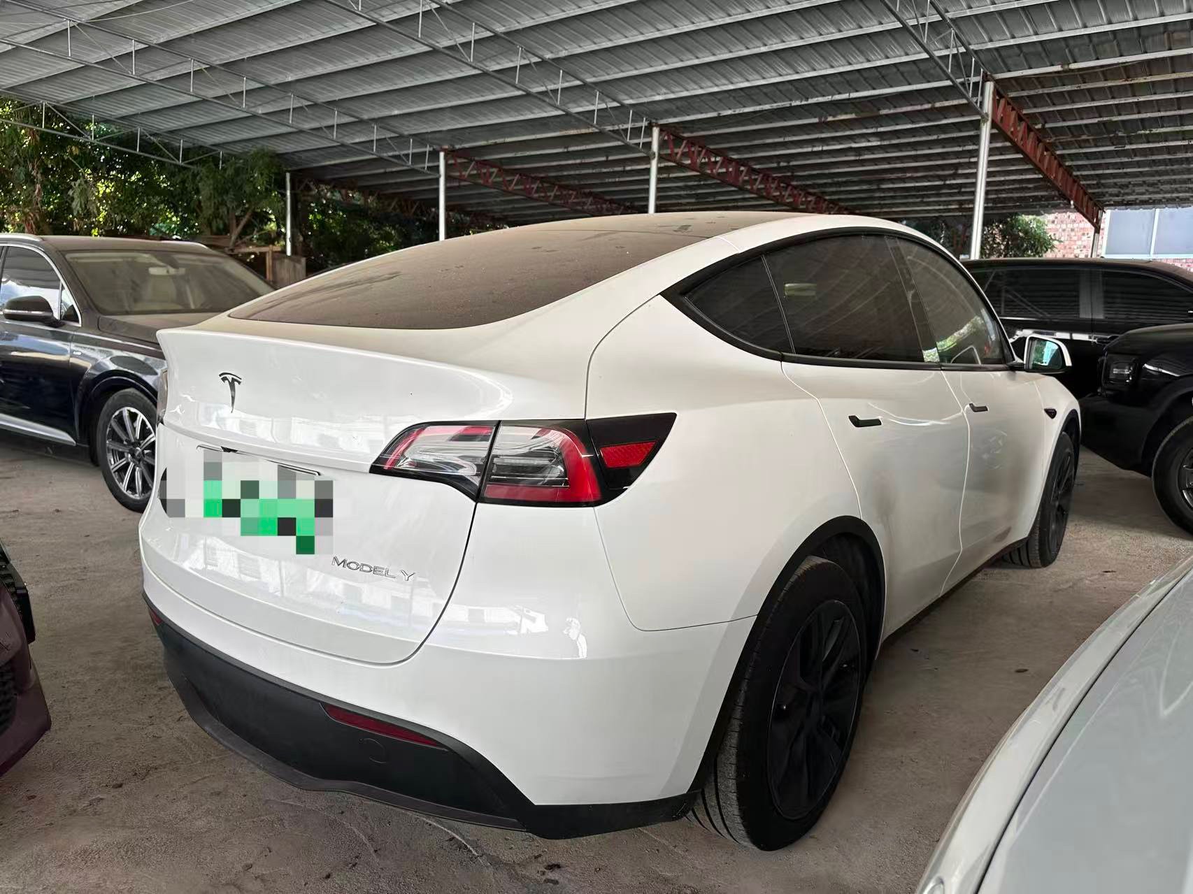 Tesla Model Y 2024 #4 Tesla Model Y 2024 car image #4