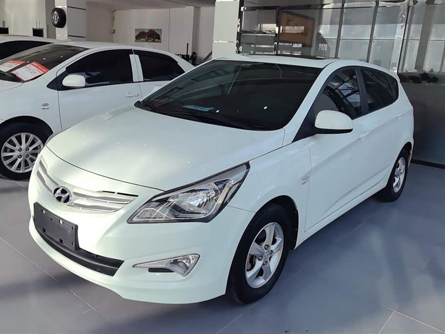 Mazda Reina Hatchback 2014 car image 