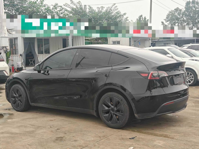 Tesla Model Y 2024 #4 Tesla Model Y 2024 car image #4