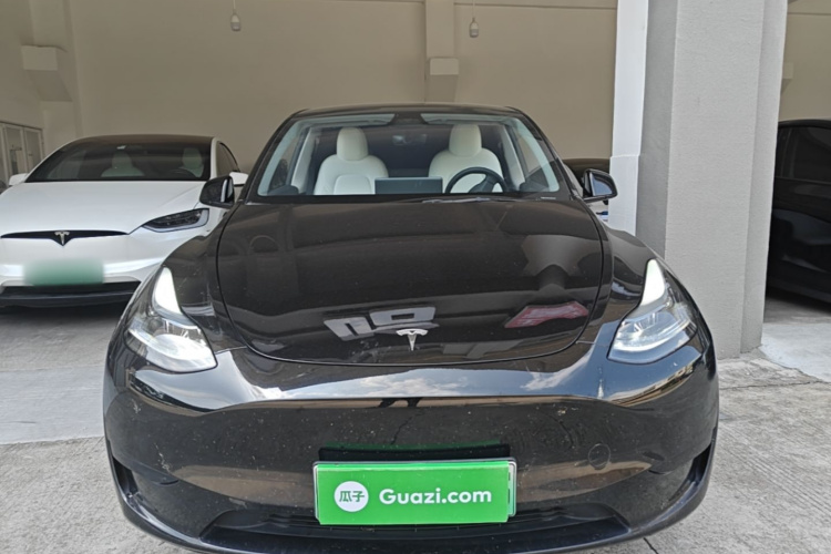 Tesla Model Y 2024 #3 Tesla Model Y 2024 car image #3