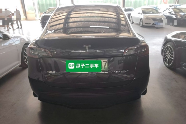 Tesla Model Y 2024 #6 Tesla Model Y 2024 car image #6