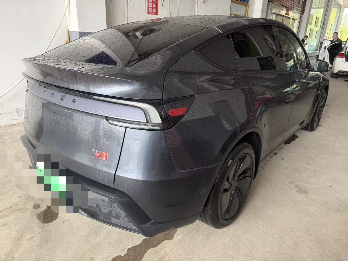 Tesla Model Y 2025 #7 Tesla Model Y 2025 car image #7