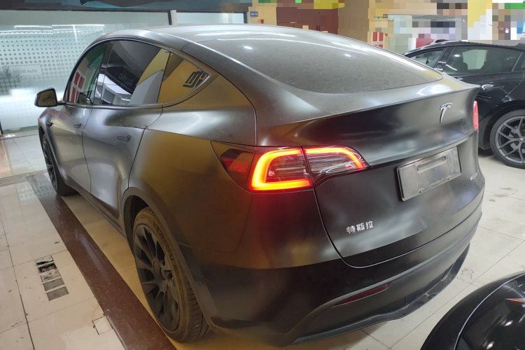 Tesla Model Y 2023 #5 Tesla Model Y 2023 car image #5