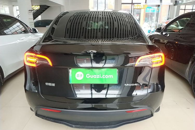 Tesla Model Y 2024 #6 Tesla Model Y 2024 car image #6