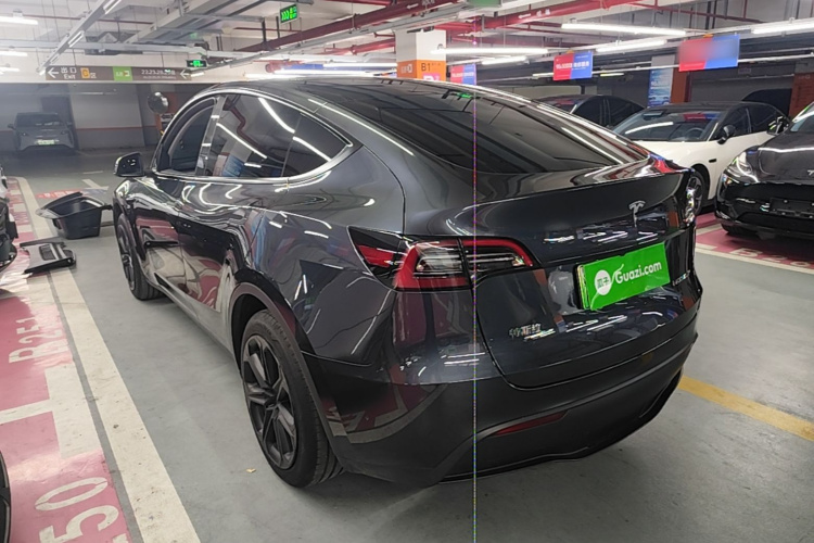 Tesla Model Y 2024 #5 Tesla Model Y 2024 car image #5