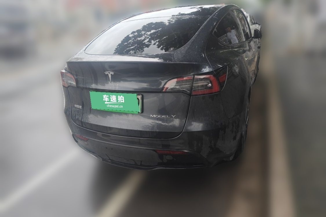 Tesla Model Y 2024 #6 Tesla Model Y 2024 car image #6