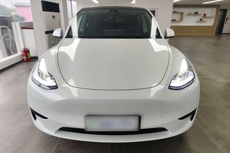Tesla Model Y 2024 #3 Tesla Model Y 2024 car image #3