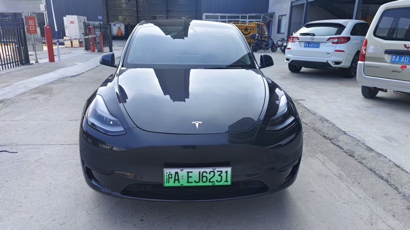 Tesla Model Y 2024 #5 Tesla Model Y 2024 car image #5