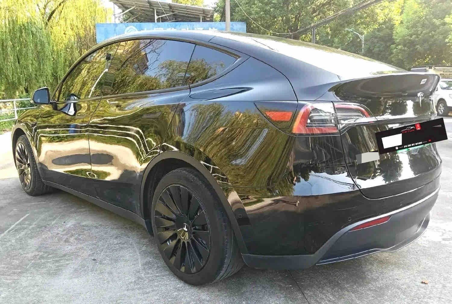 Tesla Model Y 2023 #5 Tesla Model Y 2023 car image #5