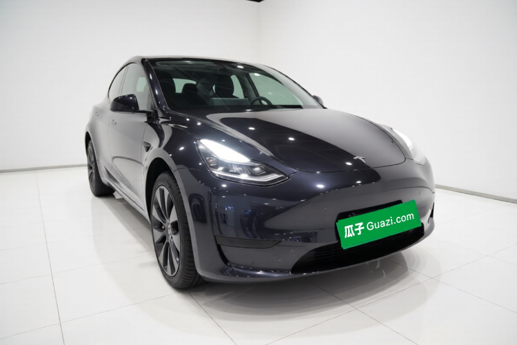 Tesla Model Y 2024 #4 Tesla Model Y 2024 car image #4