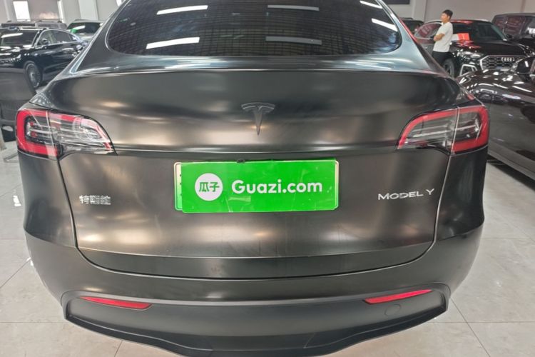 Tesla Model Y 2024 #6 Tesla Model Y 2024 car image #6