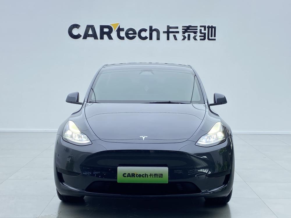 Tesla Model Y 2025 #2 Tesla Model Y 2025 car image #2