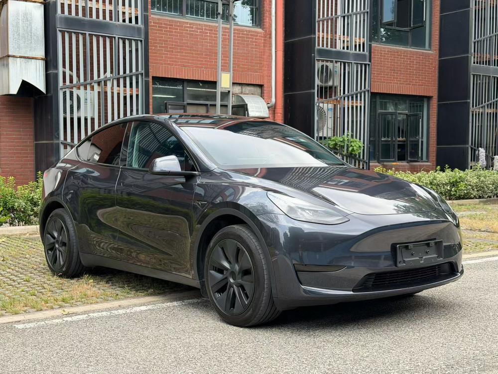 Tesla Model Y 2024 #3 Tesla Model Y 2024 car image #3