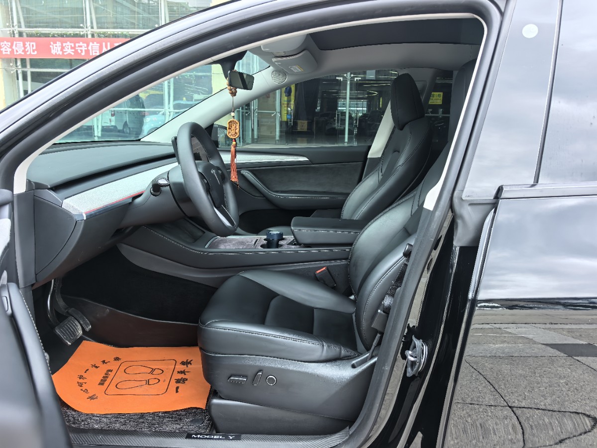 Tesla Model Y 2024 #4 Tesla Model Y 2024 car image #4
