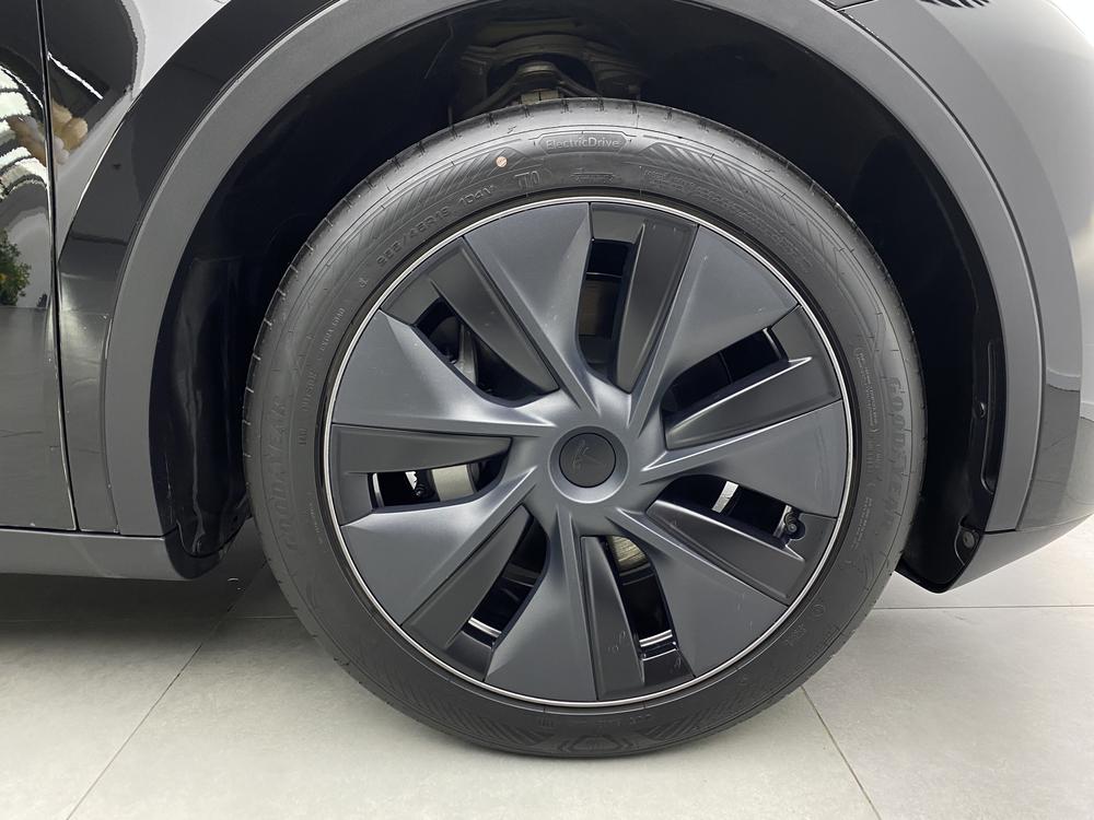 Tesla Model Y 2024 #5 Tesla Model Y 2024 car image #5