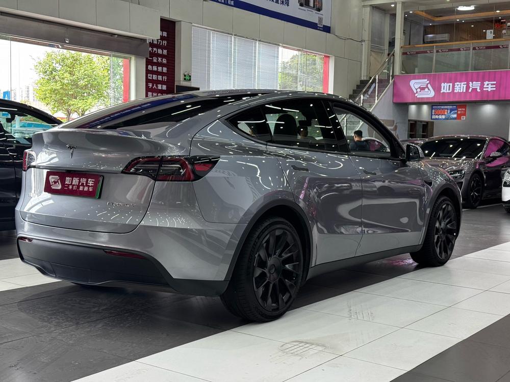 Tesla Model Y 2024 #6 Tesla Model Y 2024 car image #6