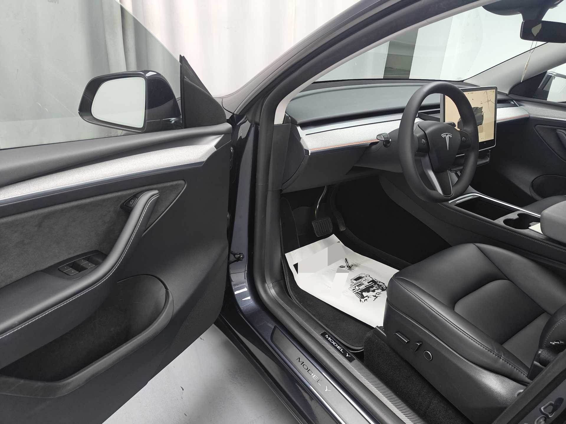 Tesla Model Y 2024 صورة سيارة #6