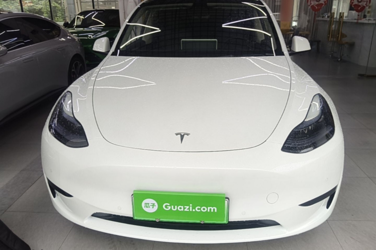 Tesla Model Y 2024 #3 Tesla Model Y 2024 car image #3
