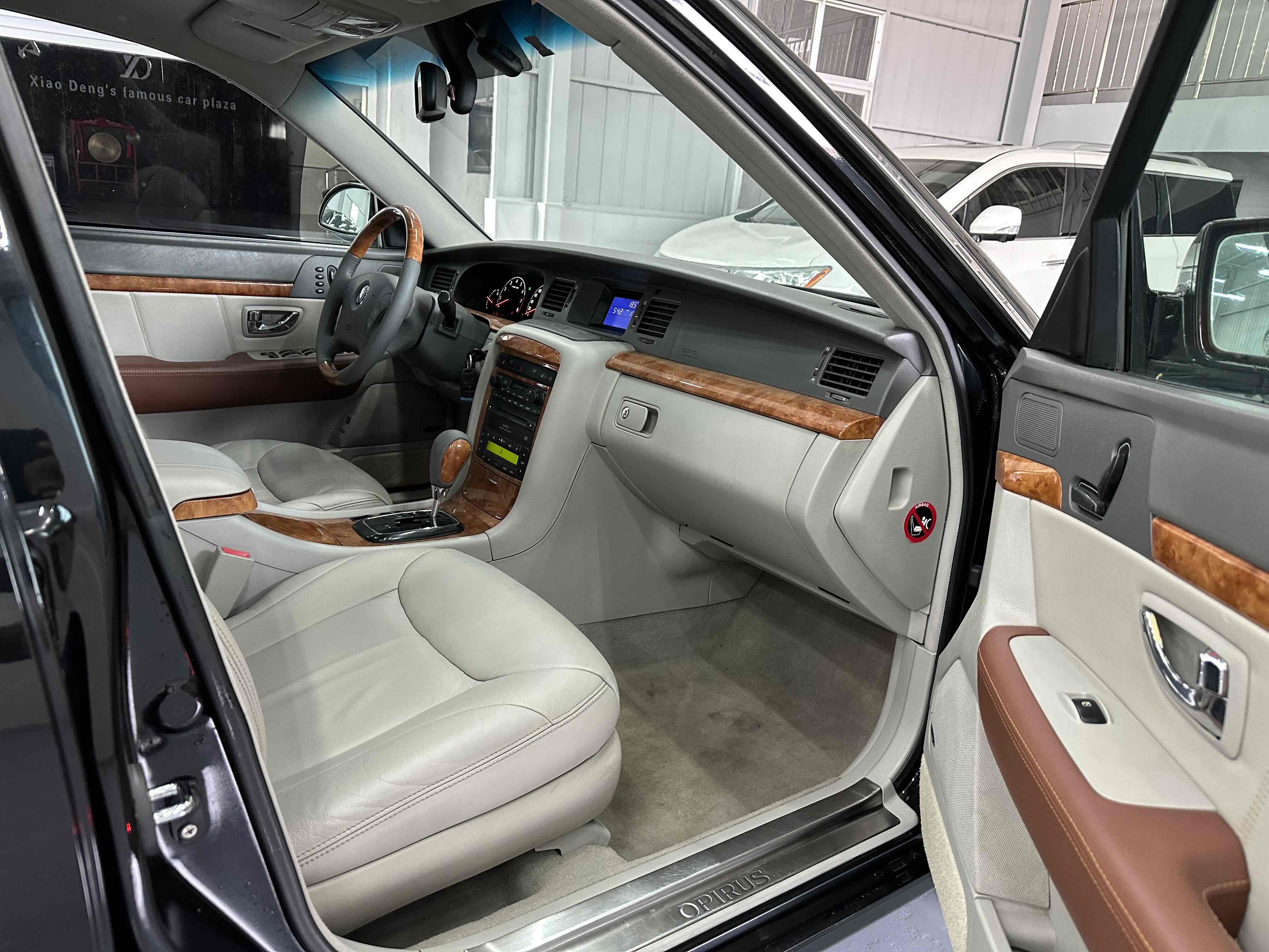 Kia Opirus 2011 صورة سيارة #8