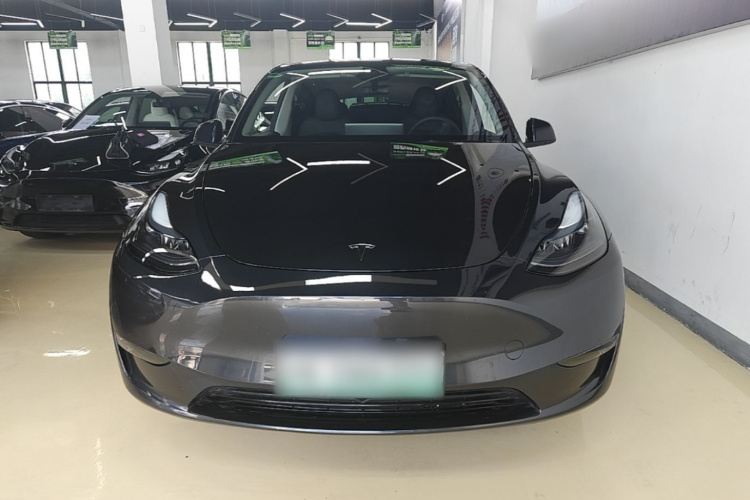 Tesla Model Y 2024 #3 Tesla Model Y 2024 car image #3